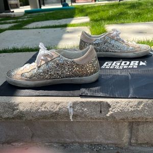 Golden Goose silver glitter sneaker with muted pink suede star